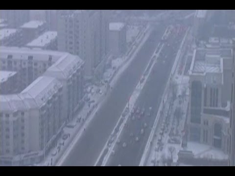 Snow Disperses Toxic Smog in China's Capital
