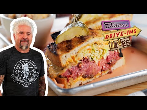Guy Fieri Blown Away by MASSIVE Corned Beef Reuben | Diners, Drive-Ins and Dives | Food Network