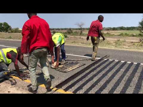 Putting rumble strips on the Mozambique roads