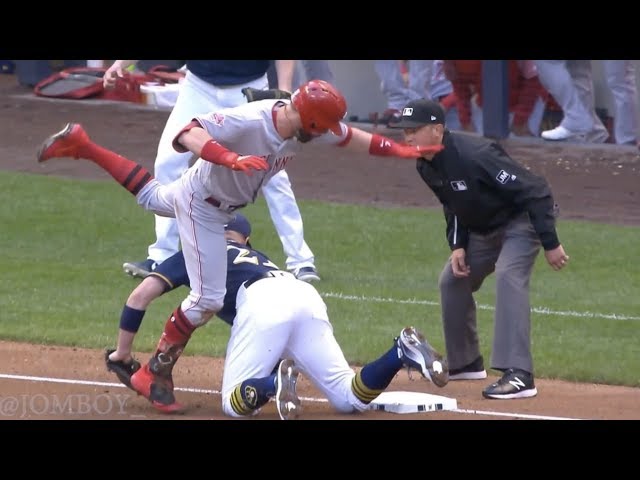Jesse Winker avoids the tag with a crazy slide, a breakdown