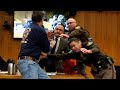 Larry Nassar: victim's father attempts attack in court