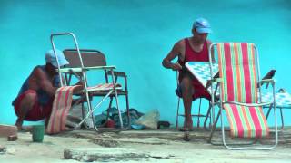 preview picture of video 'In Baracoa we saw these man sewing gardenchairs by hand'