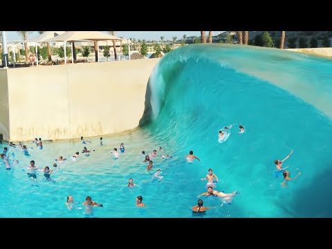wave pool BREAKS and floods water park...