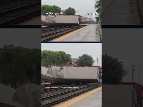Freight train and semitruck collide at suburban rail crossing