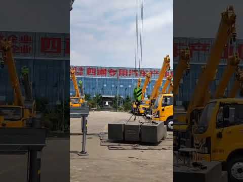 12-ton truck crane, self-weight 16 tons, lifting capacity 10 tons, under test