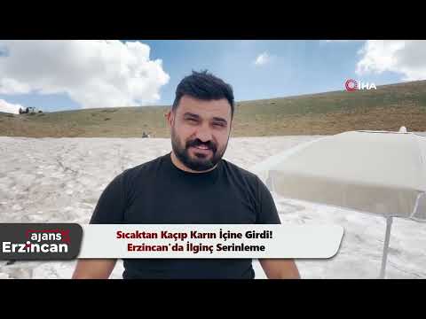 Sıcaktan Kaçıp Karın İçine Girdi! Erzincan'da İlginç Serinleme