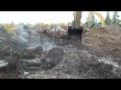 cat 330 in sloppy mud