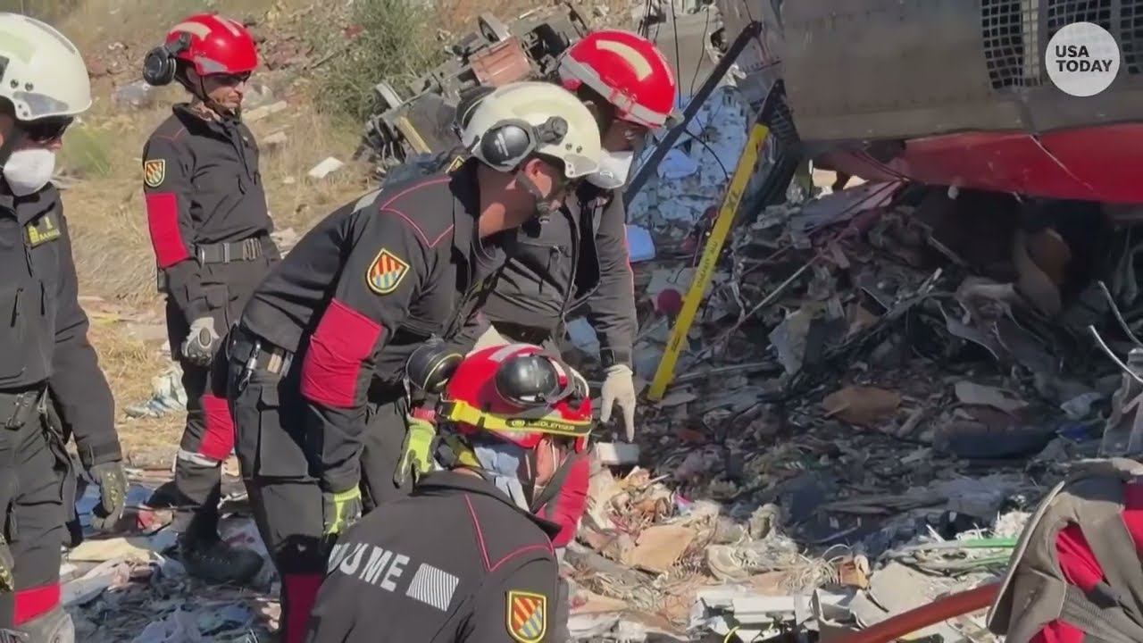 Spain train crash aftermath footage shows derailment of high-speed train cars and emergency response