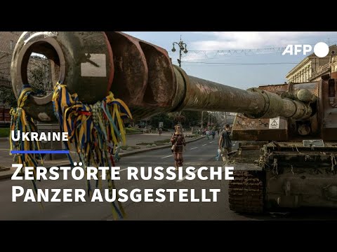 "Unsere Jungs sind Helden": Zerstörte russische Panzer in Kiew | AFP