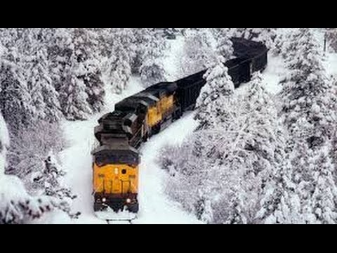 Awesome Powerful Train plow through snow railway tracks
