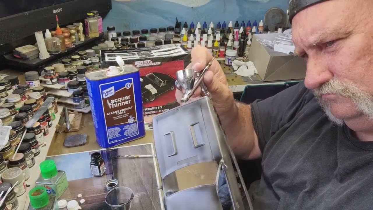 Using Testors bottle enamel to paint a scale auto body.
