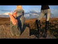 Tight Jeans Over Knee Boots And Bare Feet Walk In Beautiful Fields During Sunset