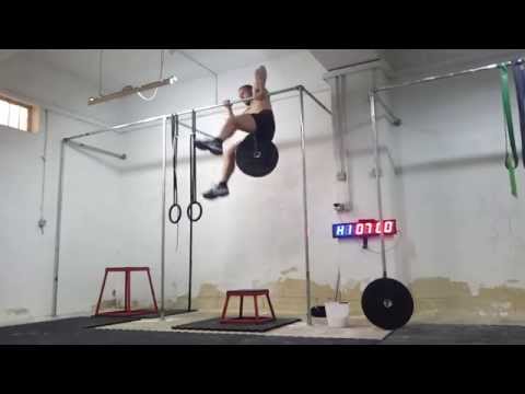Weighted One-Arm Muscle-up, 20 kg