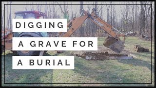 Digging a grave for a burial at a cemetery