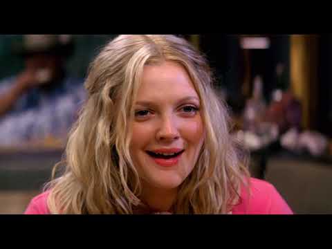 Trailer moment: roadside café exterior with ocean behind, hinting at the film’s Hawaiian setting