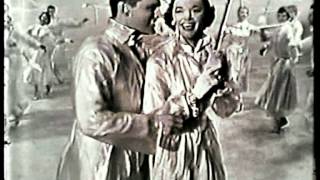 GISELE MacKENZIE welcomes spring with April Showers.  Live TV, March 26, 1955