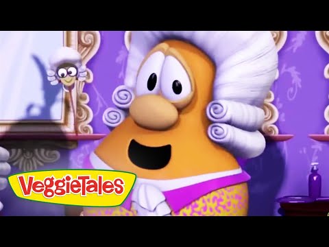 Animated carrot character with a white powdered wig and purple outfit, in a VeggieTales scene with the logo visible at the bottom left.