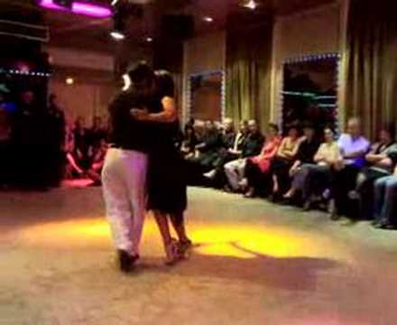  Carlos Espinoza  and  Mamié Sancy  are  dancing  to  the  milonga  "  Milonga De Mis Tiempos  "