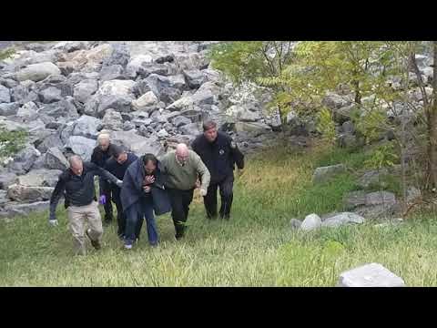 Wanted man being escorted out of Merrimack River