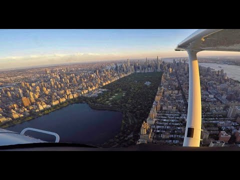 Flight over Hudson River & Central Park at sunset.