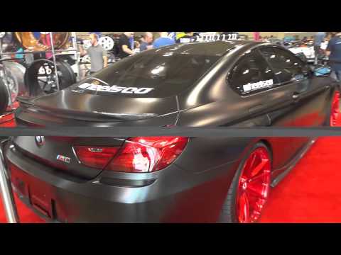 Matte Black BMW M6 With Carbon Fiber Body Kit And Red Rims