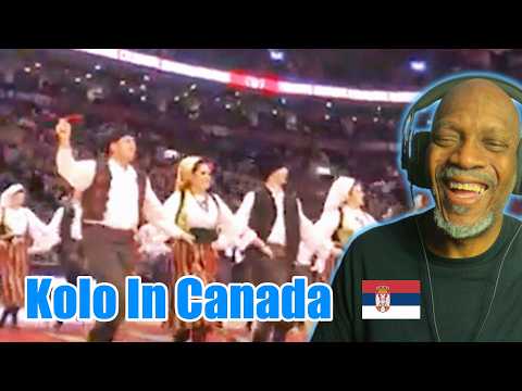 Mr. Giant ReactionSerbian Folklore Ensemble "KOLO" performs at ACC, NBA on 2014-Mar-02 .