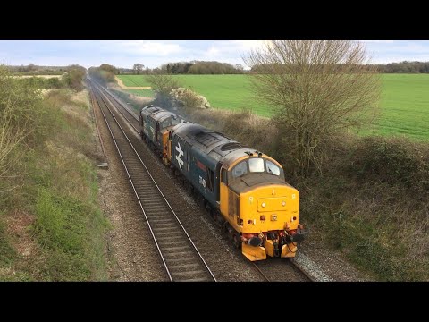 DRS 37401 and 37218 storm past Hollow Lane with 0P28