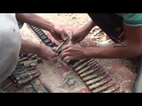 تجهيز كتيبة الحافظ الذهبي ذخيرة الرشاشات الثقيلة قبل التوجه لجبهة بلدة الزمانية في ريف دمشق