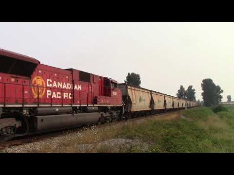 MEET!! CN 102 Meets 200 Car CP 603 W/ SD70ACU @ Matsqui Canada 14AUG21 ES44AC 3835 & 8867 Leading