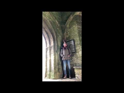Wild Windy Hair on Glastonbury Tor During a storm - Slow-mo