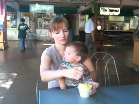 Sveta feeding ice-cream to Jason