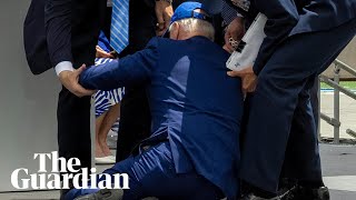 Joe Biden falls on stage at US air force academy c