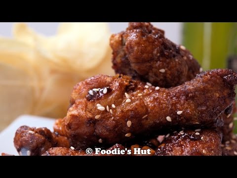 Crispy fried chicken glazed with sweet and spicy sauce