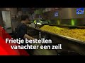 Je friet en vette snack bestel je veilig achter een zeiltje bij Cafetaria Klundert