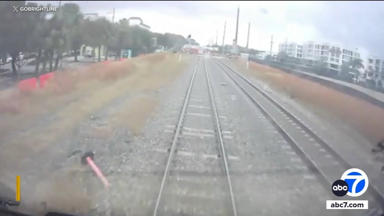 Train collides with fire truck in Florida, video shows