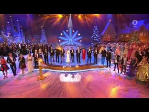 Artiesten zingen: Mitten in der Nacht & Frohe Weihnachten