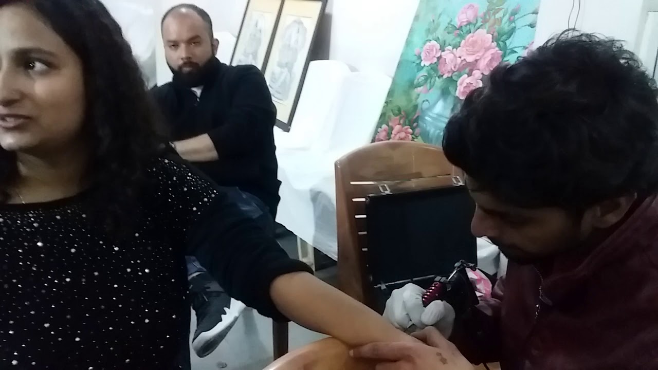 Visitors getting inked