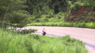 preview picture of video 'Zambia, watching a heavy loaded truck working its way up the hill'