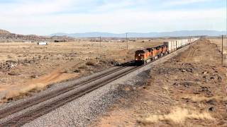preview picture of video 'BNSF Westbound stack train at  Rt 6 and old Rt 66 bridge West of  Los Lunas, New Mexico'