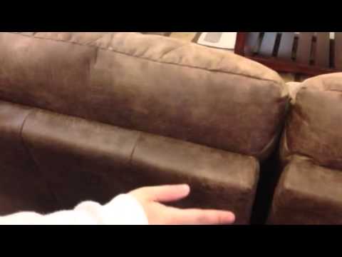 Part of a video titled How to remove the back from a La-Z-Boy sofa - YouTube