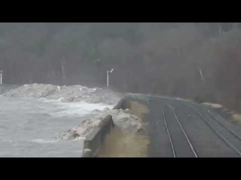 High Waves by North Wales Coast Railway Line Ffynnongroyw Wales UK