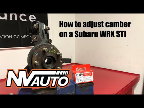How to adjust camber and install camber bolts on a MacPherson strut car
