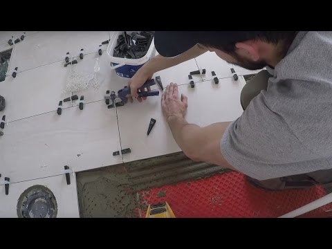 Best tile setters using Peygran Leveling System for a lippage free tile installation.