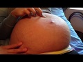 Woman Plays Around With Her Belly