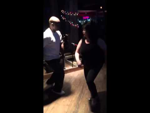 Christian Evans and Heather Fox dancing salsa at Clarendon