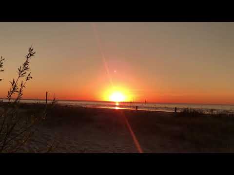 Beautiful sunset. Baltic Sea. Deva Premal