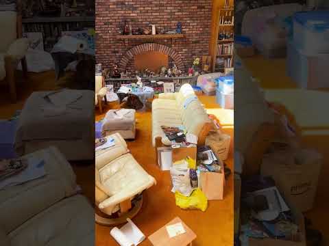 Local cleanout crew loading junk removal truck in New Jersey