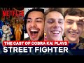 Cobra Kai Cast Plays Street Fighter II | #GeekedWeek