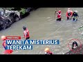 A Video Of A Mysterious Woman Has Gone Viral During A River Search