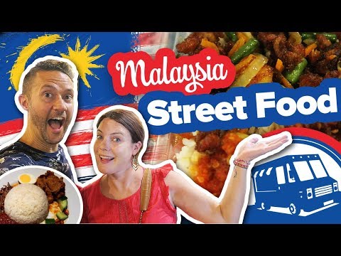 Trying Street Food in Malaysia. Food truck park in Kuala Lumpur. Malaysian Food Tour